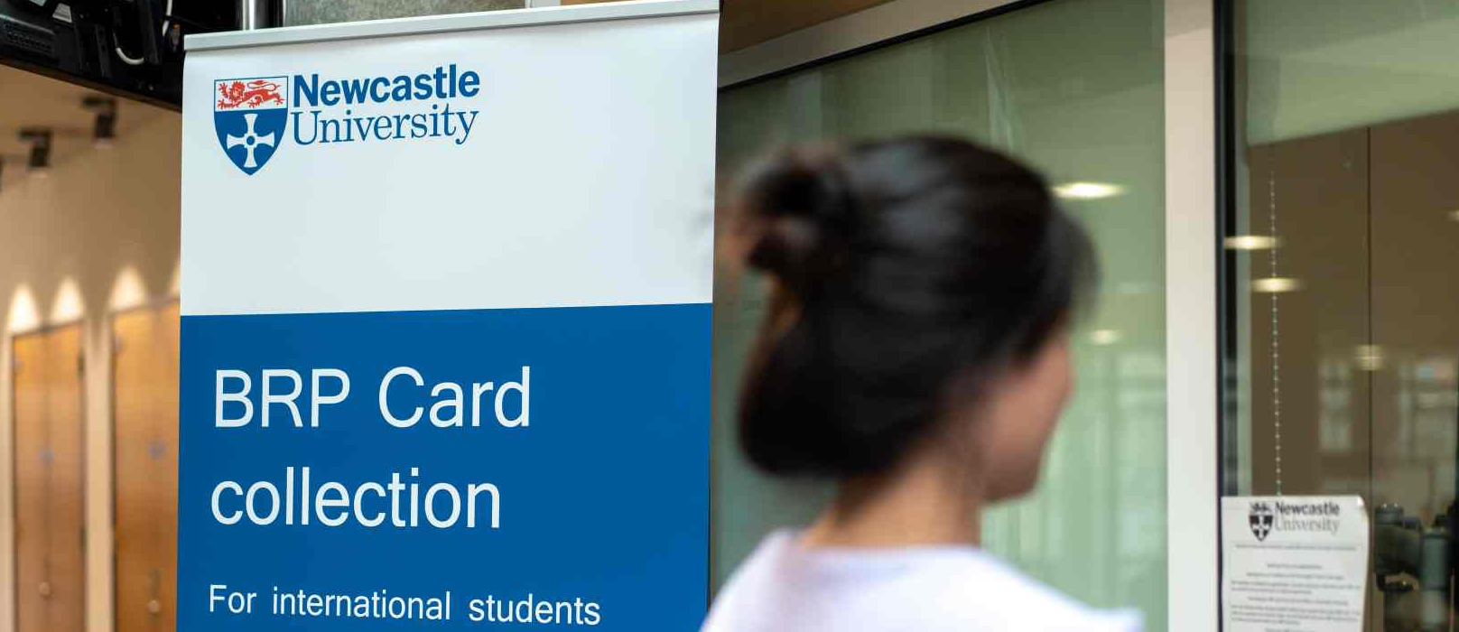 Student Collecting BRP card Student Collecting BRP card